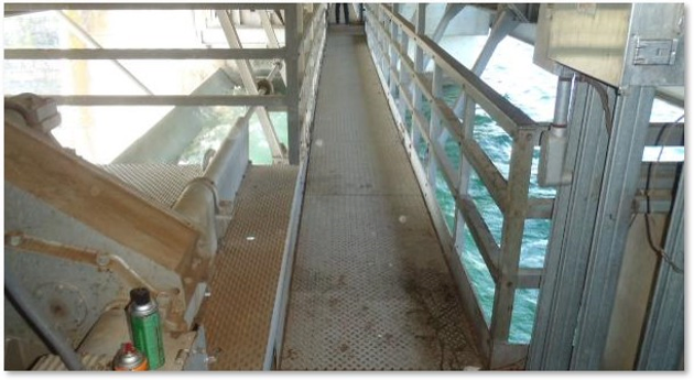 metal walkway suspended above water